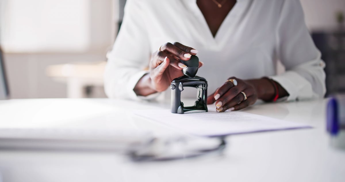 Notary stamp on contract paper or certificate in office