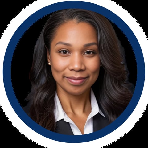 Professional headshot of a woman with long black hair wearing a black blazer and white collared shirt in a circular dark blue frame